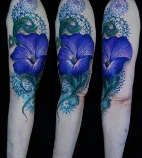 Awesome blue flower tattoo on hand