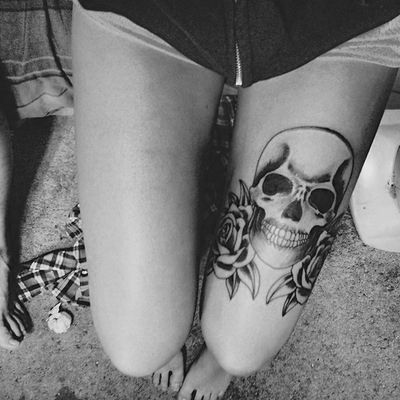 Awesome skull and rose tattoo on leg