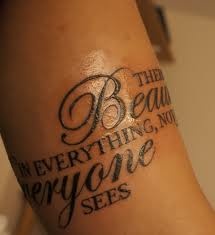 Awesome words of quote tattoo on leg