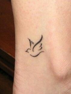 Beautiful simple bird tattoo