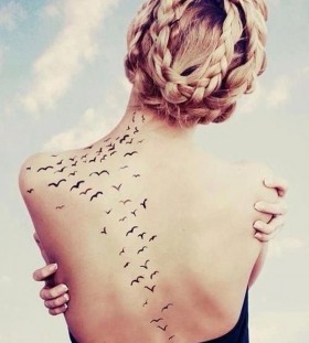 Black back birds tattoo