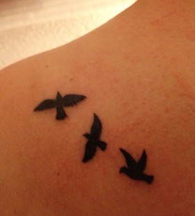 Black lovely bird tattoo