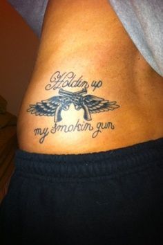 Black wings gun tattoo
