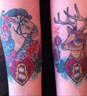Brown deer and horse tattoo on arm