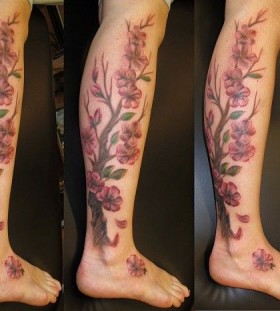 Cherry blossom red tree tattoo on leg