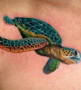 Colorful turtle tattoo on chest