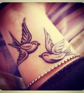 Cute couple of birds tattoo