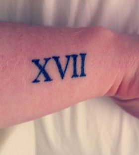 Cute simple number tattoo on arm