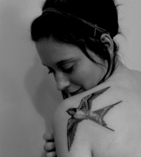 Girl shoulder bird tattoo