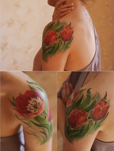 Girl with red tulips tattoo