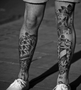 Gorgeous men's ship tattoo on leg