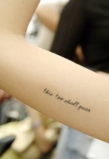 Lovely black quote tattoo on arm