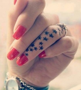 Lovely finger star tattoo on arm