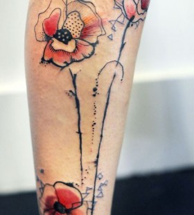 Lovely red watercolor tattoo