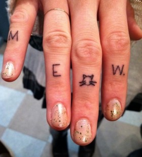 Meow letters cat tattoo on finger