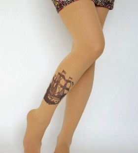 Pretty girl ship tattoo on leg
