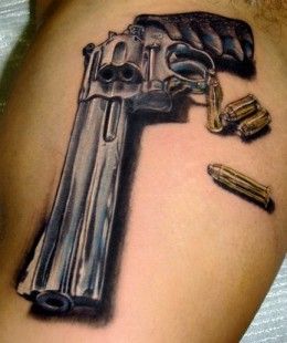Realistic dark blue gun tattoo