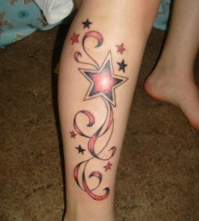 Red cool star tattoo on leg