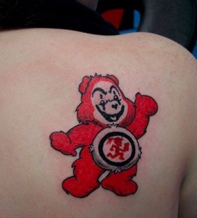 Red lovely bear tattoo on shoulder