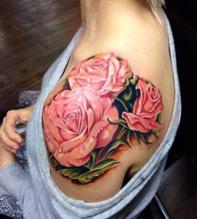 Red pretty roses tattoo on shoulder