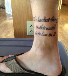 Simple words quote tattoo on leg