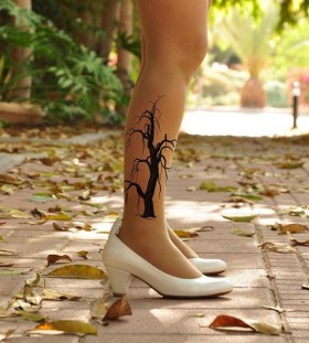 White shoes and tree tattoo on leg