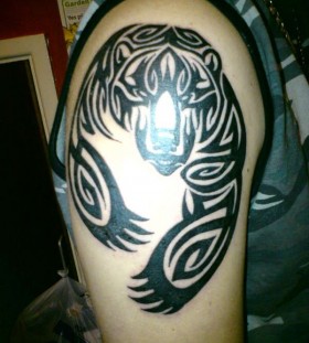 Wonderful black bear tattoo on shoulder