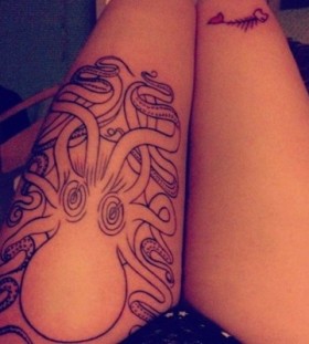 Adorable black women's octopus tattoo on leg