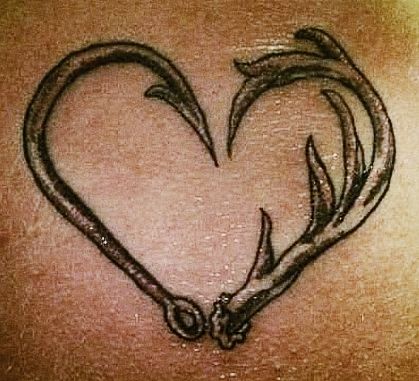 Black adorable heart fishing tattoo