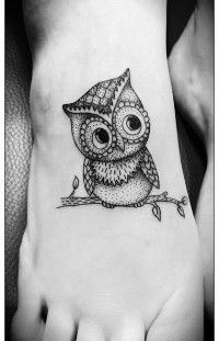 Black owl girl tattoo on foot