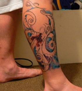 Black simple octopus tattoo on leg