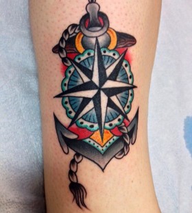 Blue lovely compass tattoo on leg