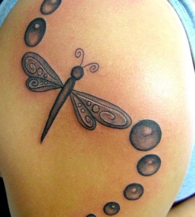 Butterfly with bubbles tattoo