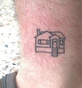Cute small house tattoo