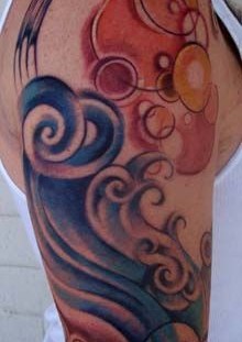 Shoulder wave and bubbles tattoo