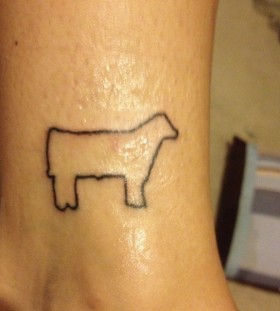 Symbol black cow tattoo