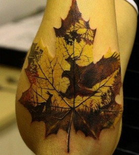 autumn leave tattoo on arm