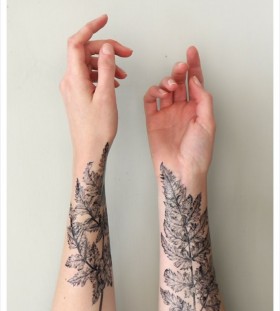 two leaves tattoo on both hands