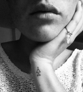 Adorable lips and triangle tattoo