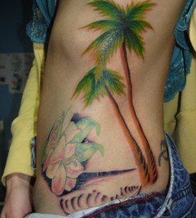 Adorable palm tree side tattoo