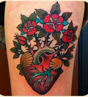 Amazing flowers tattoo by W. T. Norbert