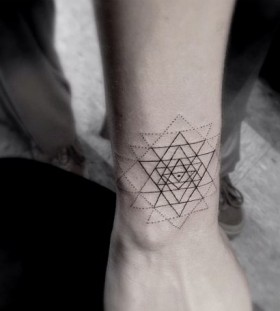 Amazing geometric tattoo by Dr Woo