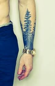 Amazing pine tree arm tattoo