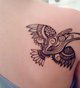 Awesome looking tribal bird tattoo