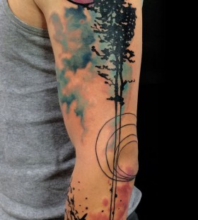 Awesome pine tree arm tattoo