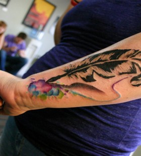 Beautiful feather pen tattoo
