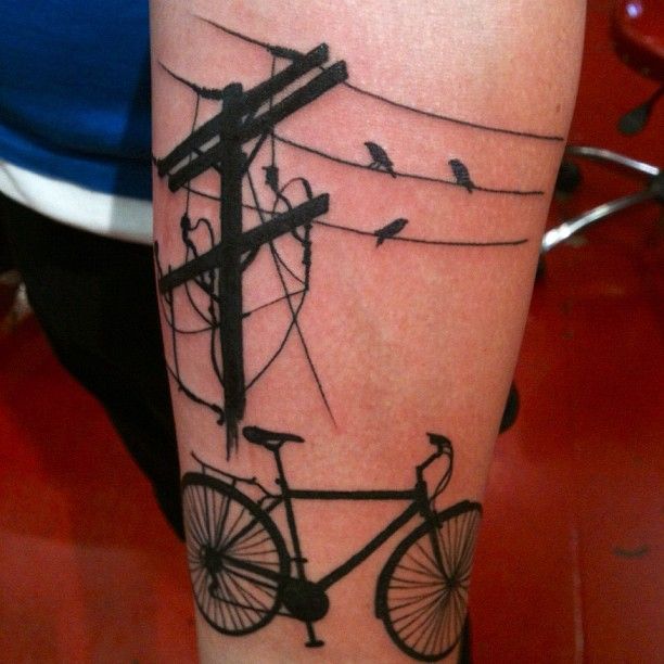 Bike, birds and black telephone tattoo