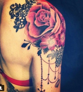 Black lace and red rose shoulder tattoo