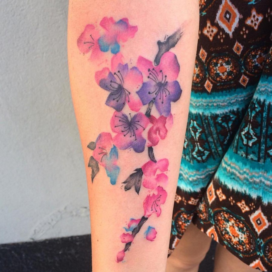 minimalist watercolor flower tattoo