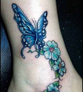 Butterfly and flowers ankle tattoo